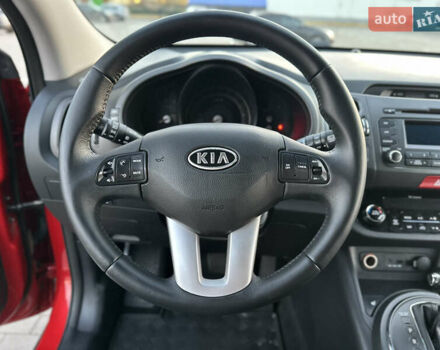 Червоний Кіа Sportage, об'ємом двигуна 2 л та пробігом 150 тис. км за 13500 $, фото 58 на Automoto.ua