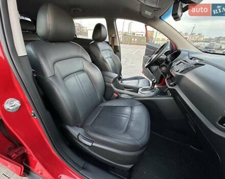 Червоний Кіа Sportage, об'ємом двигуна 2 л та пробігом 150 тис. км за 13500 $, фото 45 на Automoto.ua