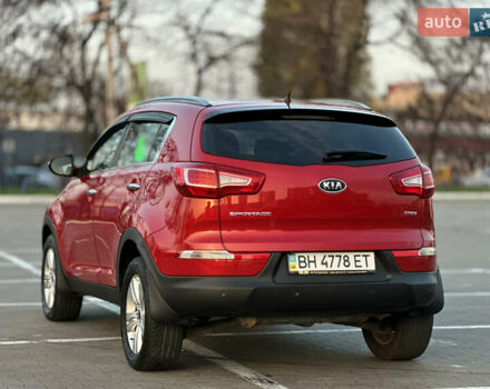 Червоний Кіа Sportage, об'ємом двигуна 2 л та пробігом 150 тис. км за 13500 $, фото 22 на Automoto.ua