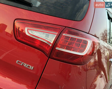 Червоний Кіа Sportage, об'ємом двигуна 2 л та пробігом 150 тис. км за 13500 $, фото 25 на Automoto.ua