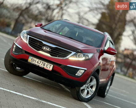 Червоний Кіа Sportage, об'ємом двигуна 2 л та пробігом 150 тис. км за 13500 $, фото 8 на Automoto.ua