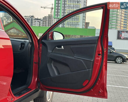 Червоний Кіа Sportage, об'ємом двигуна 2 л та пробігом 150 тис. км за 13500 $, фото 43 на Automoto.ua