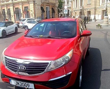 Красный Киа Sportage, объемом двигателя 2.4 л и пробегом 300 тыс. км за 10500 $, фото 1 на Automoto.ua