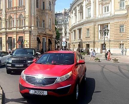 Красный Киа Sportage, объемом двигателя 2.4 л и пробегом 300 тыс. км за 10500 $, фото 4 на Automoto.ua