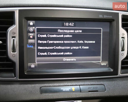 Красный Киа Sportage, объемом двигателя 2 л и пробегом 144 тыс. км за 21800 $, фото 76 на Automoto.ua