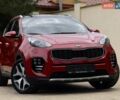 Червоний Кіа Sportage, об'ємом двигуна 2 л та пробігом 97 тис. км за 21800 $, фото 2 на Automoto.ua