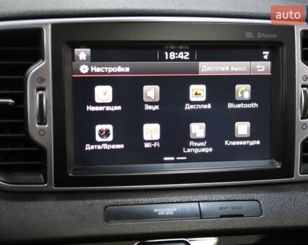 Красный Киа Sportage, объемом двигателя 2 л и пробегом 144 тыс. км за 21800 $, фото 78 на Automoto.ua