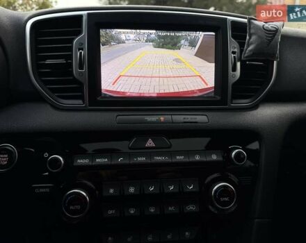 Червоний Кіа Sportage, об'ємом двигуна 2 л та пробігом 97 тис. км за 20700 $, фото 75 на Automoto.ua