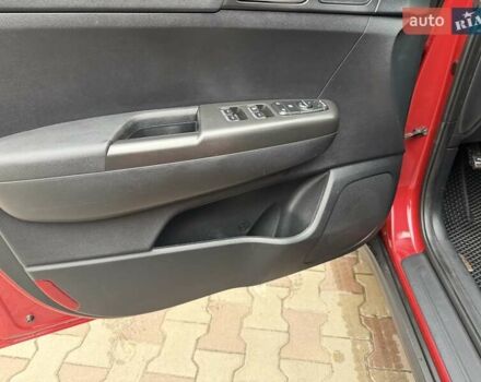 Красный Киа Sportage, объемом двигателя 2 л и пробегом 110 тыс. км за 17600 $, фото 9 на Automoto.ua