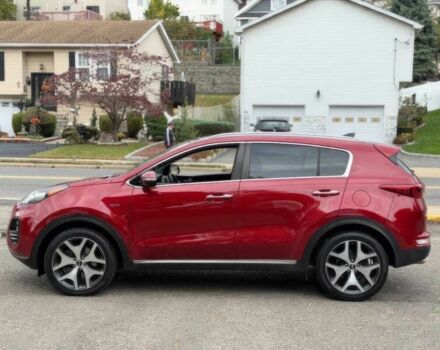 Красный Киа Sportage, объемом двигателя 2 л и пробегом 51 тыс. км за 10000 $, фото 4 на Automoto.ua