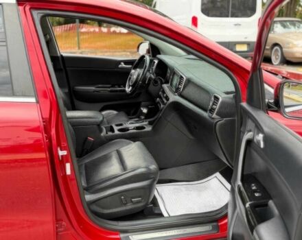 Красный Киа Sportage, объемом двигателя 2 л и пробегом 51 тыс. км за 10000 $, фото 8 на Automoto.ua