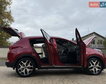 Червоний Кіа Sportage, об'ємом двигуна 2 л та пробігом 97 тис. км за 21800 $, фото 71 на Automoto.ua