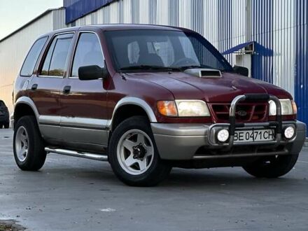 Красный Киа Sportage, объемом двигателя 2 л и пробегом 350 тыс. км за 2999 $, фото 1 на Automoto.ua