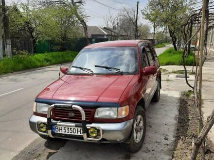 Червоний Кіа Sportage, об'ємом двигуна 2 л та пробігом 200 тис. км за 4500 $, фото 1 на Automoto.ua