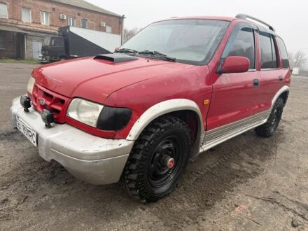 Красный Киа Sportage, объемом двигателя 2 л и пробегом 256 тыс. км за 3000 $, фото 1 на Automoto.ua