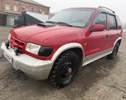 Красный Киа Sportage, объемом двигателя 2 л и пробегом 256 тыс. км за 3000 $, фото 1 на Automoto.ua