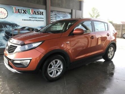 Червоний Кіа Sportage, об'ємом двигуна 2 л та пробігом 221 тис. км за 12200 $, фото 1 на Automoto.ua