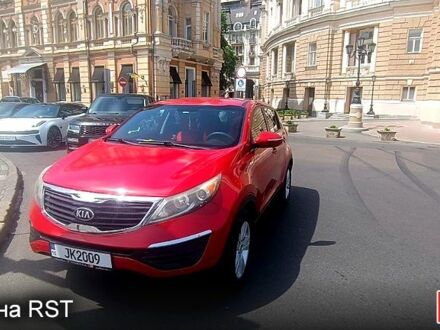 Красный Киа Sportage, объемом двигателя 2.4 л и пробегом 300 тыс. км за 10500 $, фото 1 на Automoto.ua