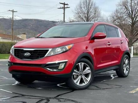 Красный Киа Sportage, объемом двигателя 2 л и пробегом 72 тыс. км за 10000 $, фото 1 на Automoto.ua