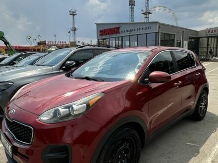 Красный Киа Sportage, объемом двигателя 2.4 л и пробегом 150 тыс. км за 12500 $, фото 1 на Automoto.ua