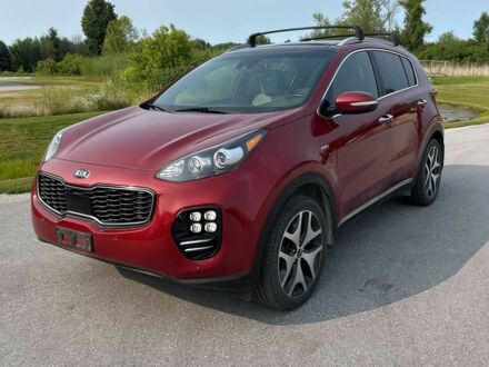Красный Киа Sportage, объемом двигателя 2 л и пробегом 117 тыс. км за 6000 $, фото 1 на Automoto.ua