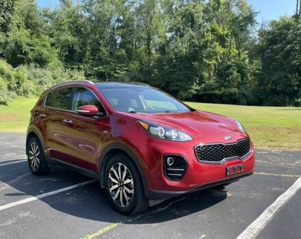 Красный Киа Sportage, объемом двигателя 2.4 л и пробегом 117 тыс. км за 8000 $, фото 1 на Automoto.ua