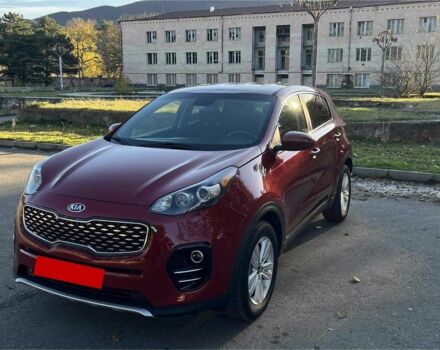 Красный Киа Sportage, объемом двигателя 2.4 л и пробегом 90 тыс. км за 12000 $, фото 1 на Automoto.ua