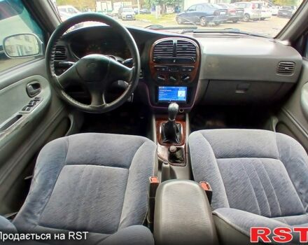 Кіа Sportage, об'ємом двигуна 2 л та пробігом 300 тис. км за 3499 $, фото 2 на Automoto.ua