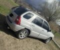 Серый Киа Sportage, объемом двигателя 2 л и пробегом 247 тыс. км за 7500 $, фото 1 на Automoto.ua
