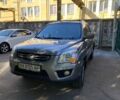 Сірий Кіа Sportage, об'ємом двигуна 2 л та пробігом 206 тис. км за 9999 $, фото 1 на Automoto.ua