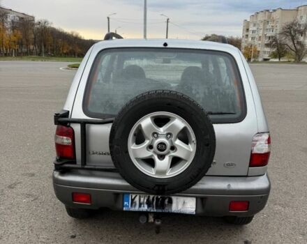 Серый Киа Sportage, объемом двигателя 2 л и пробегом 300 тыс. км за 3092 $, фото 2 на Automoto.ua