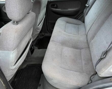 Серый Киа Sportage, объемом двигателя 2 л и пробегом 300 тыс. км за 3092 $, фото 4 на Automoto.ua