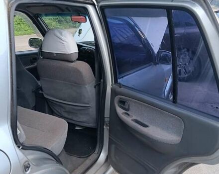 Серый Киа Sportage, объемом двигателя 2 л и пробегом 277 тыс. км за 3300 $, фото 13 на Automoto.ua