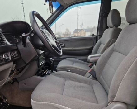 Серый Киа Sportage, объемом двигателя 2 л и пробегом 300 тыс. км за 4500 $, фото 7 на Automoto.ua