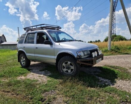 Серый Киа Sportage, объемом двигателя 2 л и пробегом 300 тыс. км за 4500 $, фото 10 на Automoto.ua