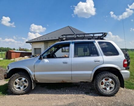 Серый Киа Sportage, объемом двигателя 2 л и пробегом 300 тыс. км за 4500 $, фото 12 на Automoto.ua