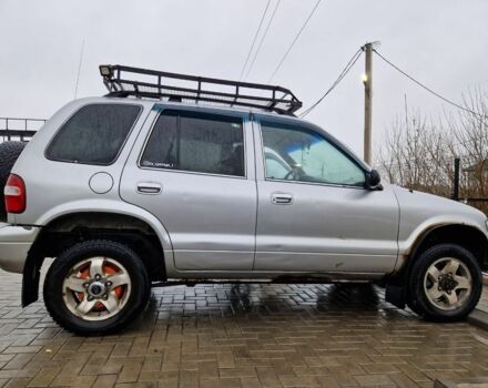 Серый Киа Sportage, объемом двигателя 2 л и пробегом 300 тыс. км за 4500 $, фото 1 на Automoto.ua