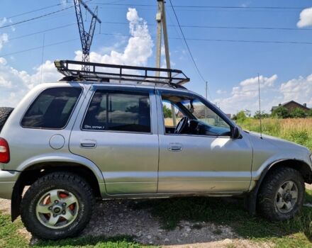 Серый Киа Sportage, объемом двигателя 2 л и пробегом 300 тыс. км за 4500 $, фото 11 на Automoto.ua