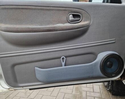 Серый Киа Sportage, объемом двигателя 2 л и пробегом 300 тыс. км за 4500 $, фото 4 на Automoto.ua