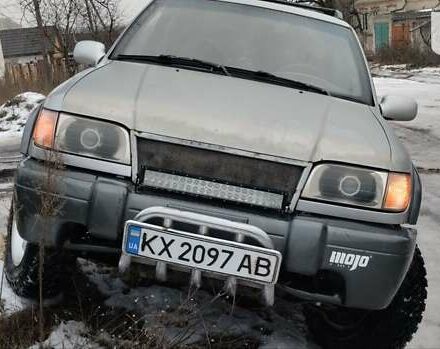 Сірий Кіа Sportage, об'ємом двигуна 2 л та пробігом 308 тис. км за 5200 $, фото 1 на Automoto.ua