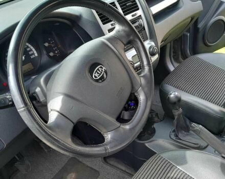 Серый Киа Sportage, объемом двигателя 2 л и пробегом 220 тыс. км за 7900 $, фото 5 на Automoto.ua