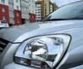 Серый Киа Sportage, объемом двигателя 2 л и пробегом 206 тыс. км за 6700 $, фото 6 на Automoto.ua