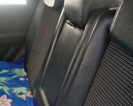 Серый Киа Sportage, объемом двигателя 2 л и пробегом 137 тыс. км за 8000 $, фото 5 на Automoto.ua