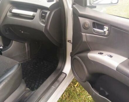 Серый Киа Sportage, объемом двигателя 2 л и пробегом 137 тыс. км за 8000 $, фото 3 на Automoto.ua