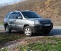 Серый Киа Sportage, объемом двигателя 2 л и пробегом 165 тыс. км за 7900 $, фото 1 на Automoto.ua