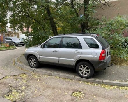 Серый Киа Sportage, объемом двигателя 2 л и пробегом 256 тыс. км за 5999 $, фото 1 на Automoto.ua