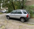 Серый Киа Sportage, объемом двигателя 2 л и пробегом 256 тыс. км за 5999 $, фото 1 на Automoto.ua