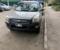 Серый Киа Sportage, объемом двигателя 2 л и пробегом 187 тыс. км за 5000 $, фото 1 на Automoto.ua