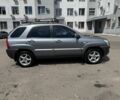 Серый Киа Sportage, объемом двигателя 2 л и пробегом 200 тыс. км за 4200 $, фото 4 на Automoto.ua