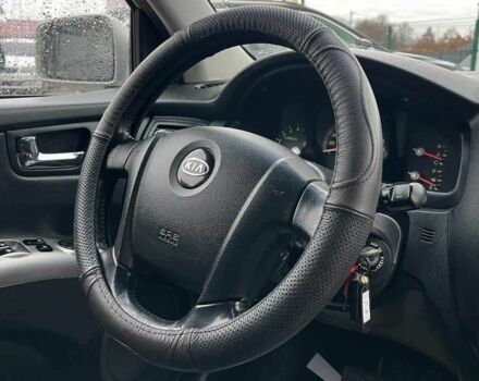 Серый Киа Sportage, объемом двигателя 2 л и пробегом 265 тыс. км за 7600 $, фото 14 на Automoto.ua